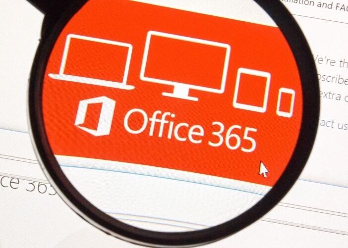 Magnifying glass over Office 365 logo highlighting need for real backup and disaster recovery solutions.